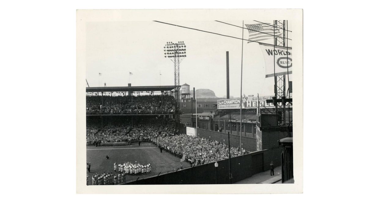 cammillerfilms's tweet photo. One of the things I had hoped for when GABP was built was the pennants and championship flags flying high over the ballpark. Why not celebrate them prominently? The raising of the flags on Opening Day 1920 and 1941 at Crosley. #Reds #FlyingHighNow https://t.co/66kyva3WWH