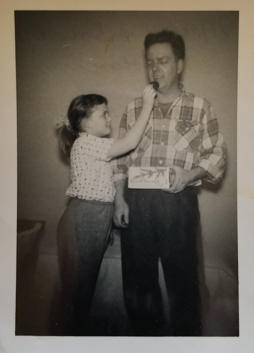 Vster001's tweet photo. Found this amazing picture of my mom feeding her dad @girlscouts cookies when she was 10 in 1956. Long tradition in our family! https://t.co/Vgl4L8YXQf