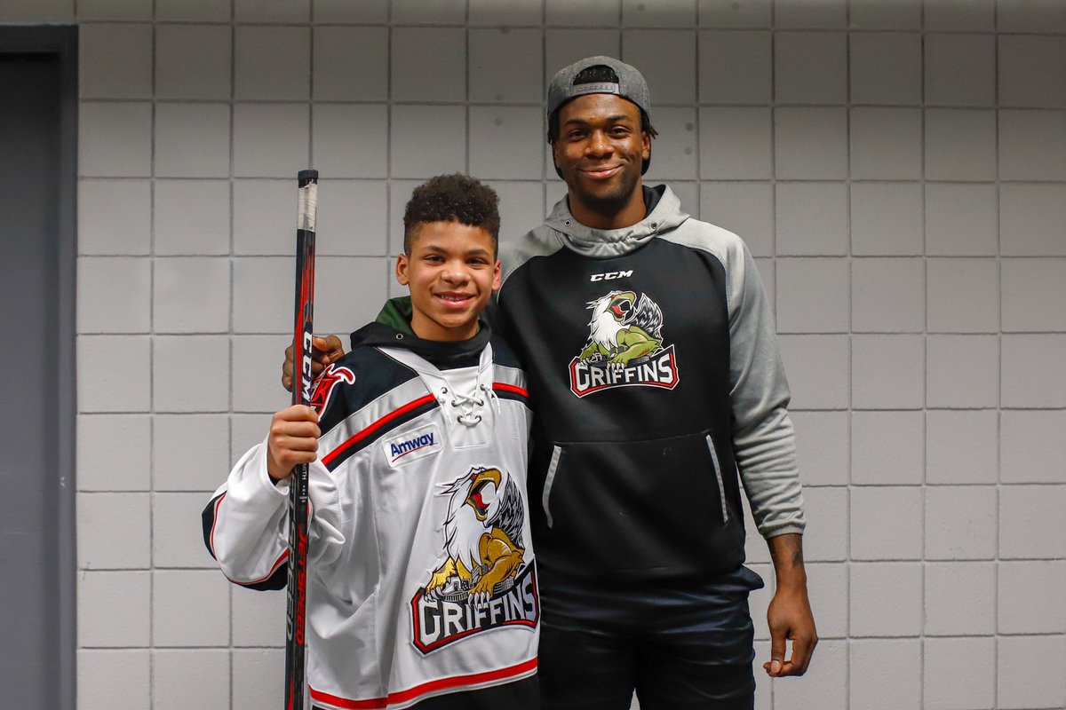 griffinshockey's tweet photo. Last night Ty Cornett, a young Detroit hockey player who has been subjected to racial bullying, was invited by our own @givanismith24 for him and his family to come enjoy a Griffins game. The two met post-game, where Smith encouraged him to never quit. Thanks for coming, Ty! https://t.co/ty9TTMeFgy