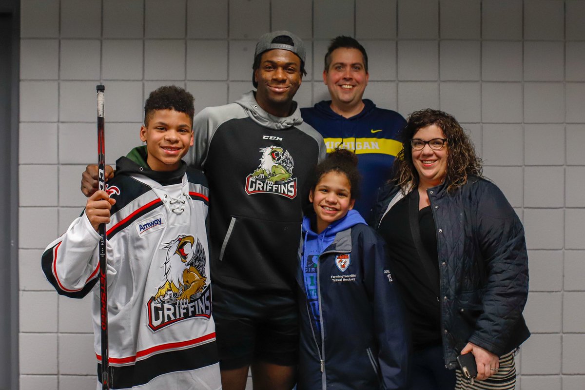 griffinshockey's tweet photo. Last night Ty Cornett, a young Detroit hockey player who has been subjected to racial bullying, was invited by our own @givanismith24 for him and his family to come enjoy a Griffins game. The two met post-game, where Smith encouraged him to never quit. Thanks for coming, Ty! https://t.co/ty9TTMeFgy