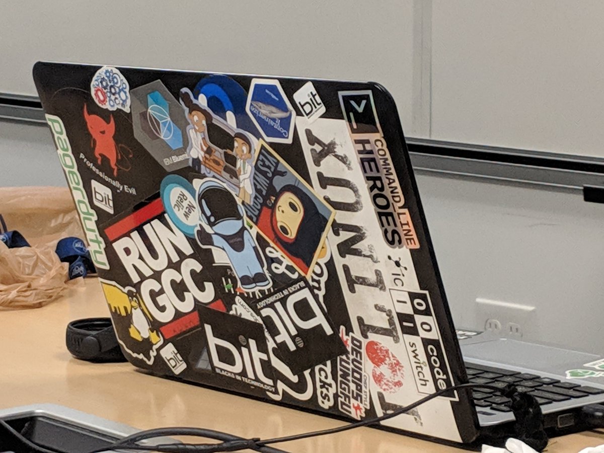 BitCincinnati's tweet photo. No #hackathon is complete without a laptop covered in tech stickers #BaseballHackDay #Cincinnati #blacksintechnology #techdiversity https://t.co/N85fG4a9Yr