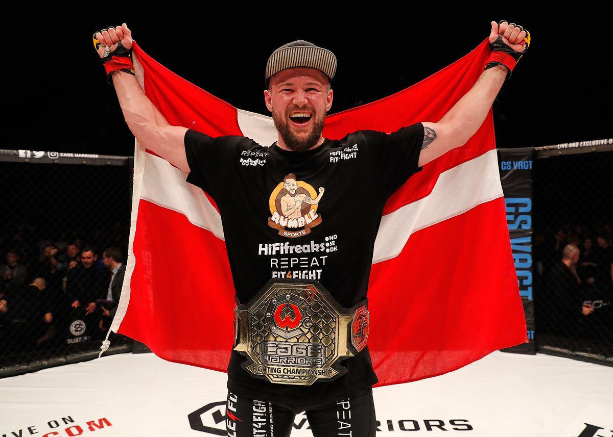 sherdogdotcom's tweet photo. Nicolas Dalby, Soren Bak win interim belts at @CageWarriors 103 https://t.co/V9rbxb45x9 via @Tudor_leo #CW103 https://t.co/FORmIiBIx6