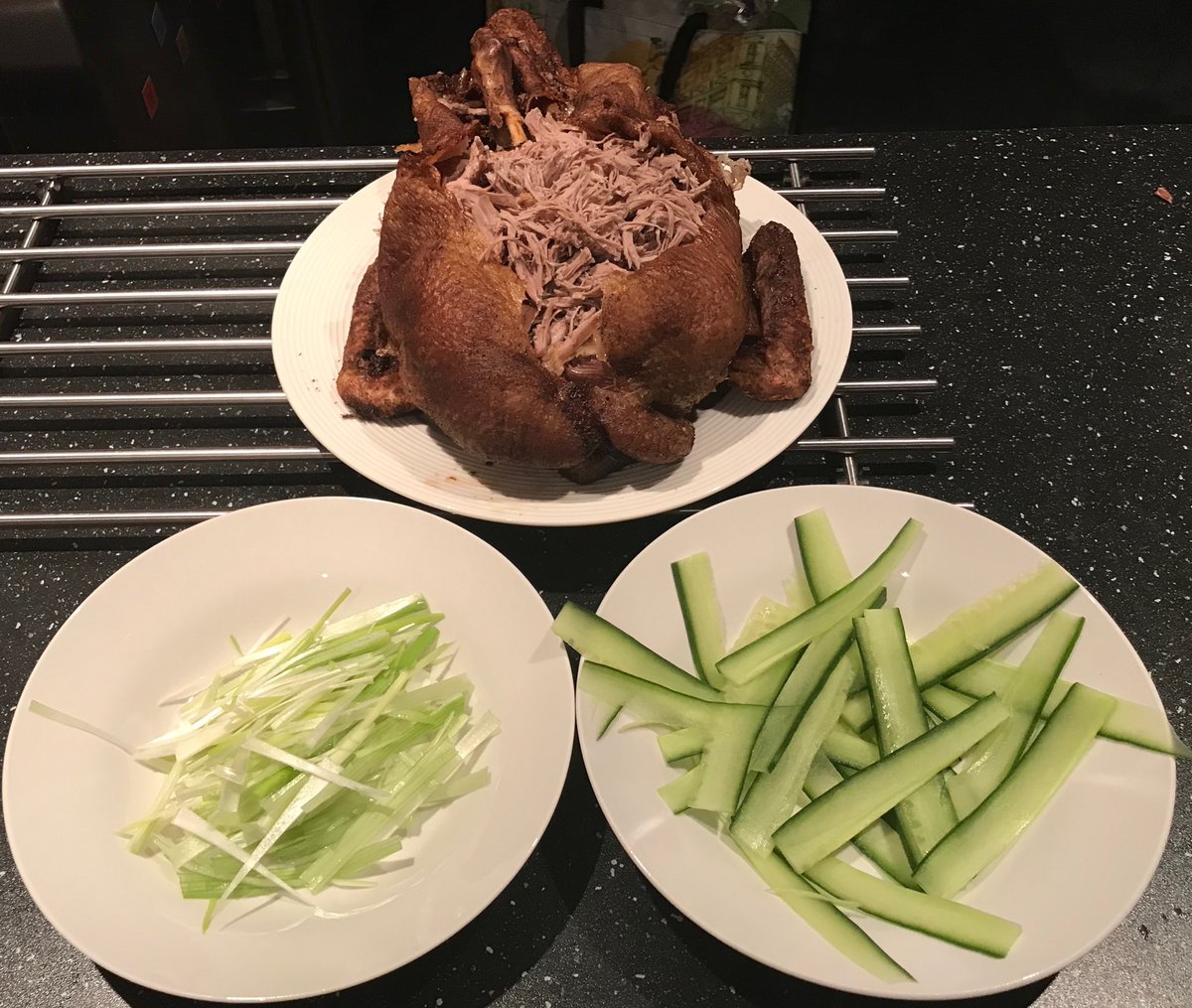 A nice easy Sunday roast...perfect for a match day. Whole roast duck...drizzle with oil...cover in plenty of five spice...roast on a rack at 160C for 1hr...knock down to 140C for 2.5-3hrs. Serve with shredded spring onion, cucumber, Hoi Sin dipping sauce &amp; pan-fried small wraps
