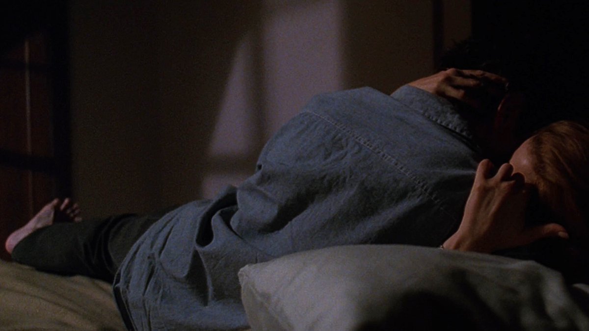 "Padgett. On his bed, lying with his back to us. And -- ohmygod -- it appears that he's entwined with someone, kissing this someone passionately, his legs entwined with hers. And we fear the worst. No, it can't be. Not Scully." #XFSciptWatch  #Milagro