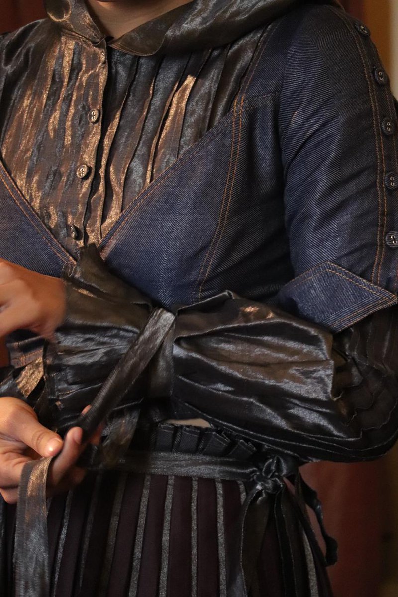 fdciofficial's tweet photo. Each thread weaves a story and #AmitaGupta brings to you a collection of conscious choices with layered lapels & pleated bell sleeves. Stay tuned as she takes you through her collection, an amalgamation of denim, silk, and zari this #LMIFW AW19. @LotusHerbals @LIVAFashionIn https://t.co/0IyYK7MG6F