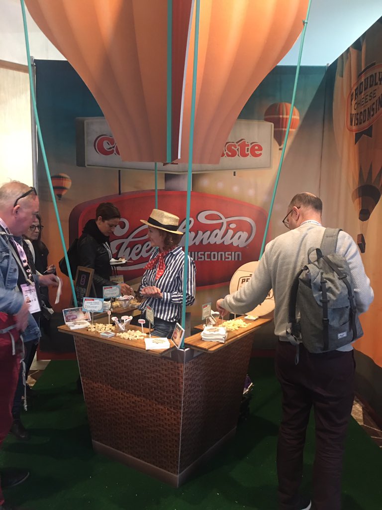 jennbosser's tweet photo. What a treat! Tasting Wisconsin cheese at Cheeselandia Wisconsin Booth  The Sartorf Bellavitano Gold is the best! @SXSW #Raleigh2SXSW https://t.co/oiIGFKQ8GN