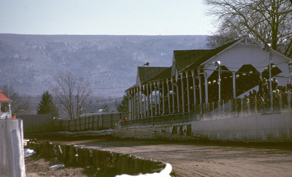 VntgSprintCars's tweet photo. Cool shot of @PortRoyalSpdway's legendary covered grandstand. Notice the snow on the Tuscarora Mountains, as well as behind the rail on the front stretch. The backdrop for the speedway will likely look very similar for this weekend's season opener! Ted Van Pelt photo. https://t.co/9v4Ikb28Jx