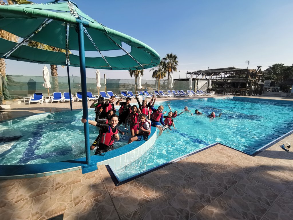 JPS_Year5's tweet photo. After the adventures of the coral where #JPS5G explored a range of sea creatures 🐟🐠🦀, we were sent to the pool for to warm up and relax. It has been a very stressful afternoon indeed 😎 #JPSyear5camp2019 https://t.co/zRFNnqeoMM