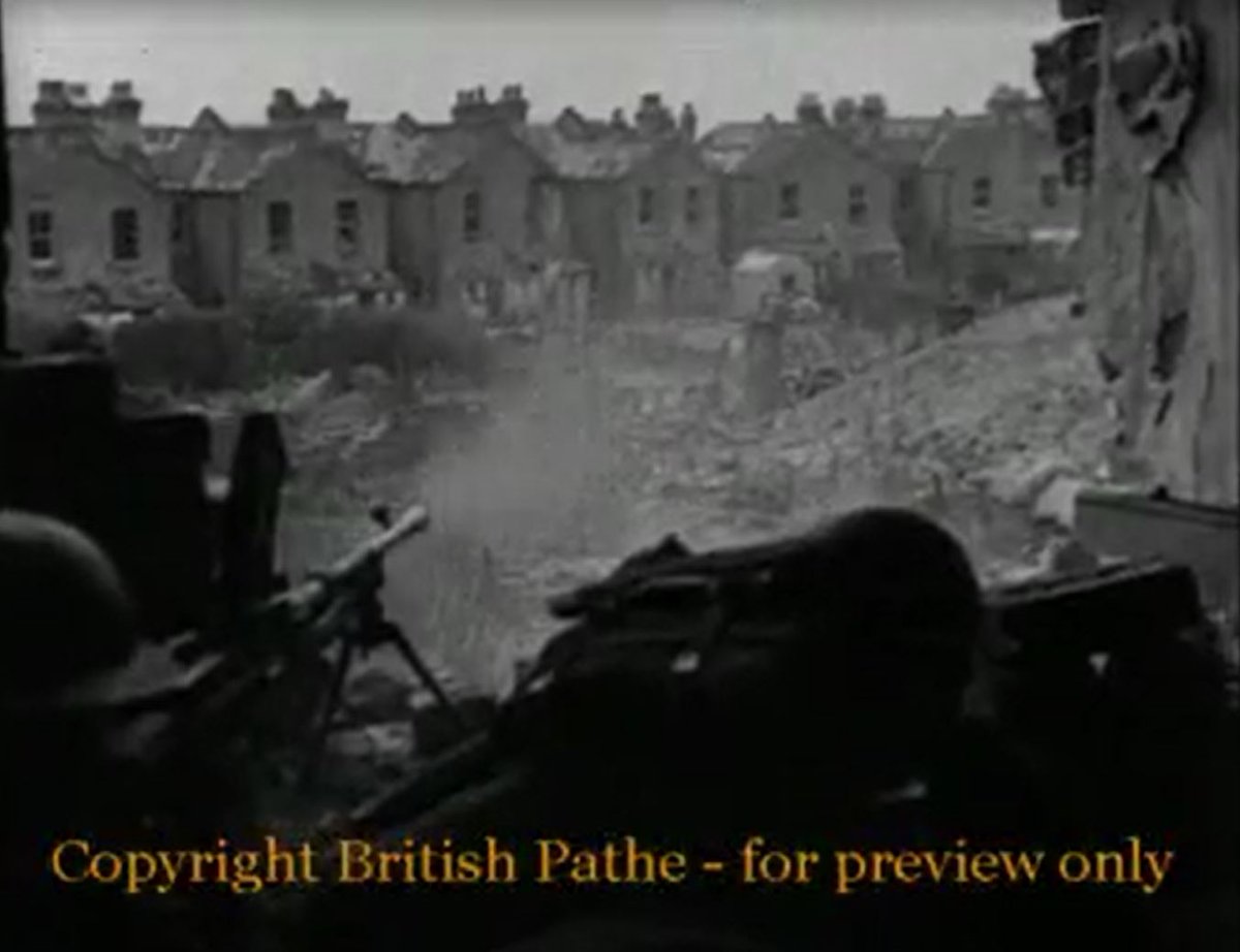 The cracks above the kneeling soldier appear in this  @BritishPathe video from 1942. It's almost certainly the same time, and the streets they train on are clearly not Lymington. The closest street fighting training area I know of is Southampton.  https://www.britishpathe.com/video/backbone-of-our-army