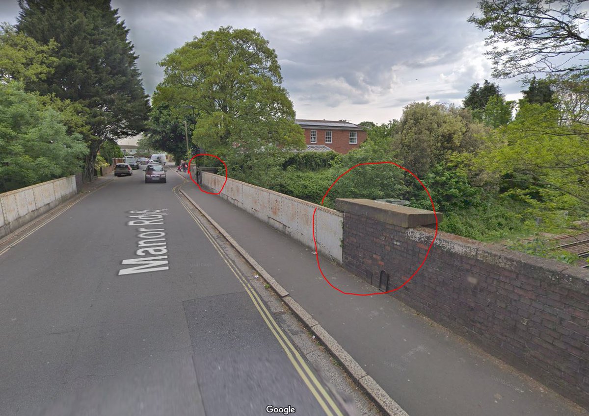 The siding north of Woolston Station has since been removed, but the bridge appears to be the same, with a metal wall and slightly raised bollards at either end.  https://www.google.com/maps/place/50%C2%B053'57.0%22N+1%C2%B022'28.5%22W/@50.8982697,-1.3751662,194a,35y,25.14h,26.28t/data=!3m1!1e3!4m6!3m5!1s0x0:0x0!7e2!8m2!3d50.8991545!4d-1.3745794