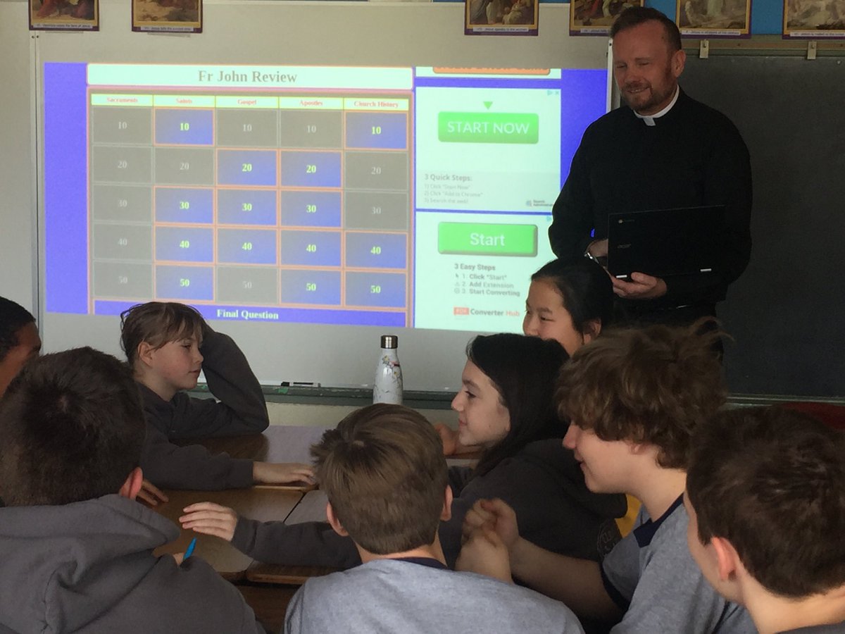 arvin5th's tweet photo. Father John visited the eighth grade today and hosted a Jeopardy style game to review what they have learned in religion class ⁦@StAugustineElem⁩ @principal567 https://t.co/Y8J6Zy9gAu