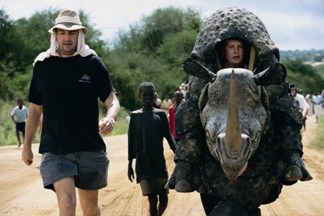 Douglas walking next to the rhino costume