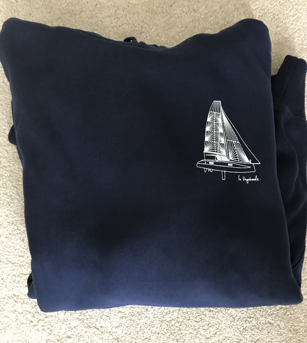 ghhutch's tweet photo. @Sailing_LaVaga super pumped that my La Vagabonde merch just arrived!  I suspect that this hoodie would’ve protected mad dog when he passesed out. (Love the bit where you were pulled by the dinghy too) https://t.co/jd1RVkkzcX