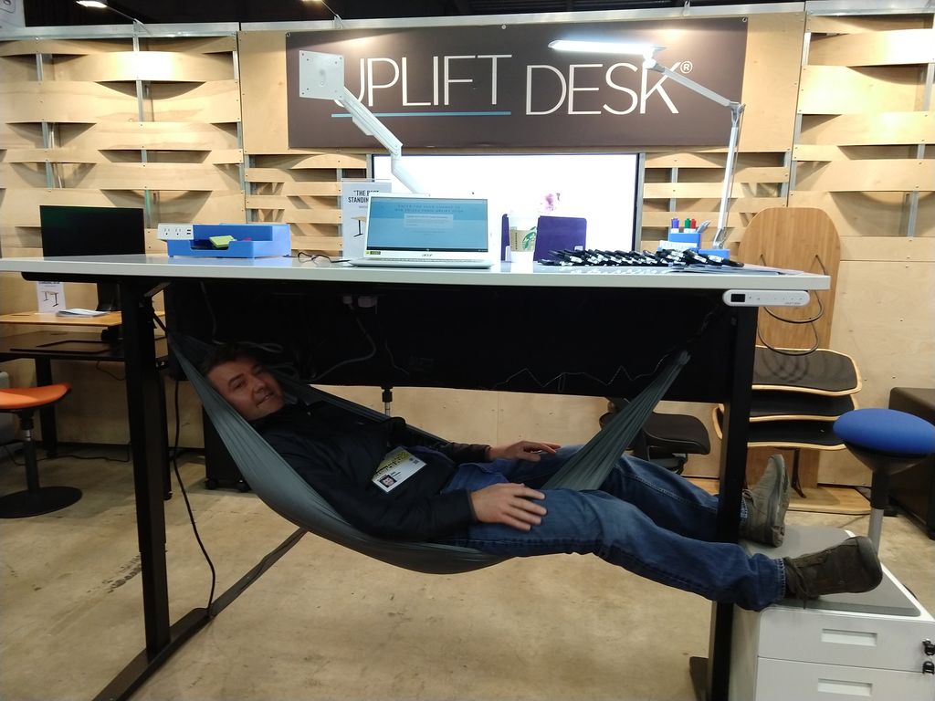 UPLIFT Desk on X: The SXSW Trade show is going great! Check out the owner  of UPLIFT Desk taking a break from the activities in our new Under Desk  Hammock that's a