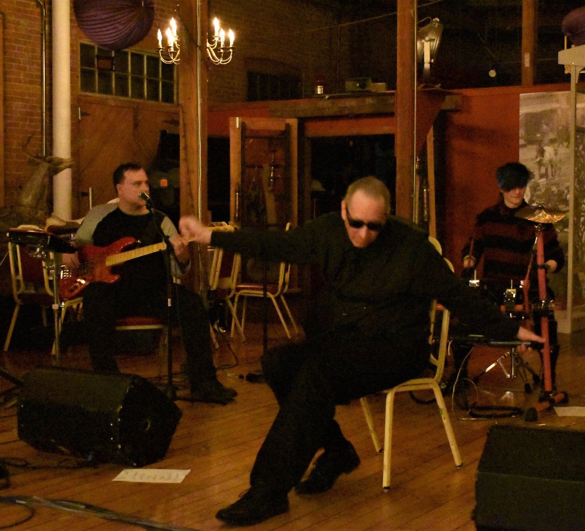 My band sat down in solidarity with me - Nigel.  #steampunk #goth