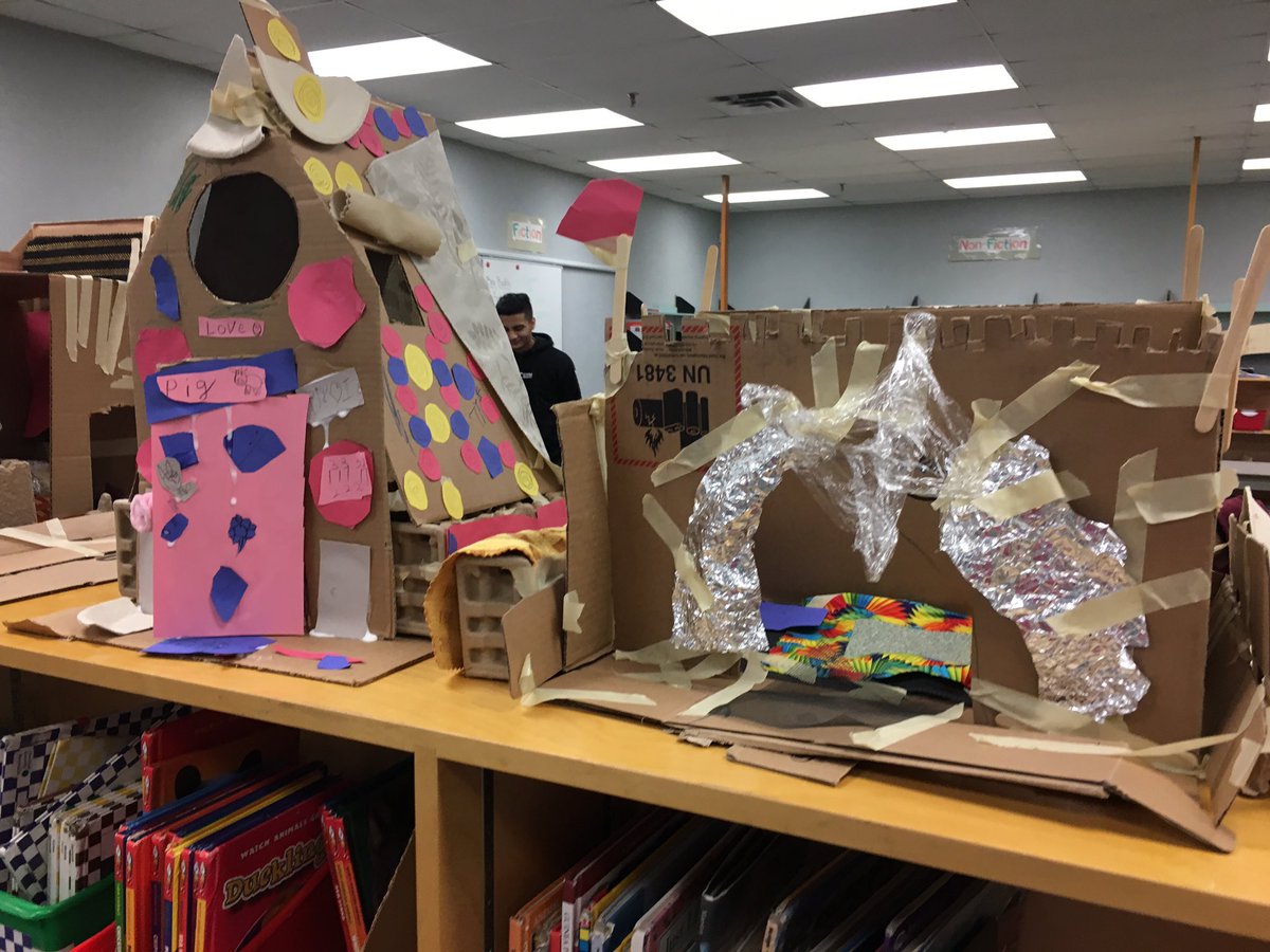 judith_hardman's tweet photo. @pdeconti Piggie houses are complete! They survived a move to the library but I’m not sure they would survive the big bad Wolf! Luckily, our library is pretty safe! Thanks again for the cardboard! #ADSTJoy #ScienceJoy https://t.co/MRiiqwceYn