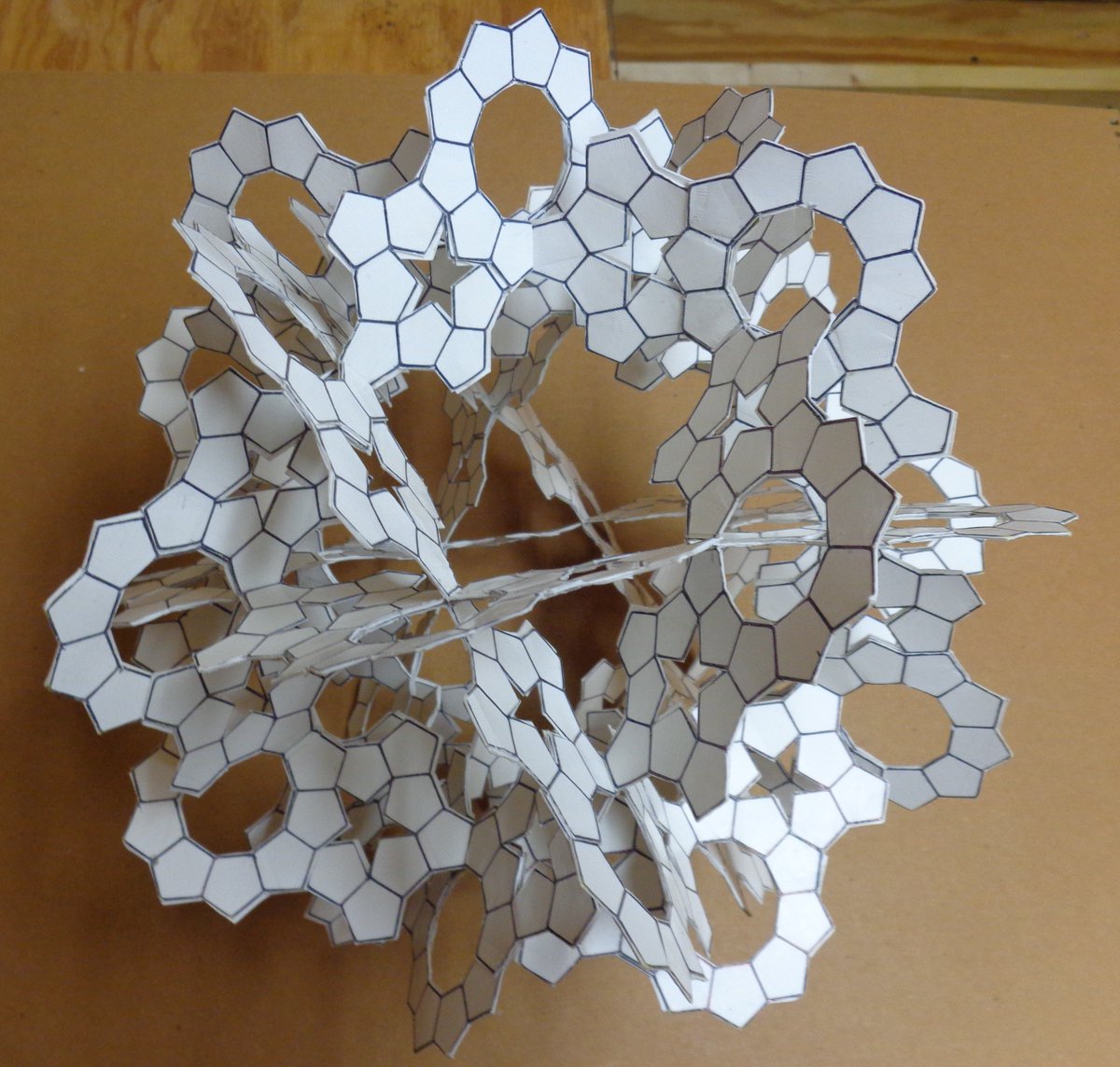 AlbertPCarpent1's tweet photo. Polygonal Hexaplanar Monosurface 2018 (Paper and Pen). This is a one sided structure composed of regular pentagons similar to a Mobius strip, but much more complex. #cognitivegeometry #geometry #mathematics #Mobiusstrip https://t.co/DFbP6QLwE5