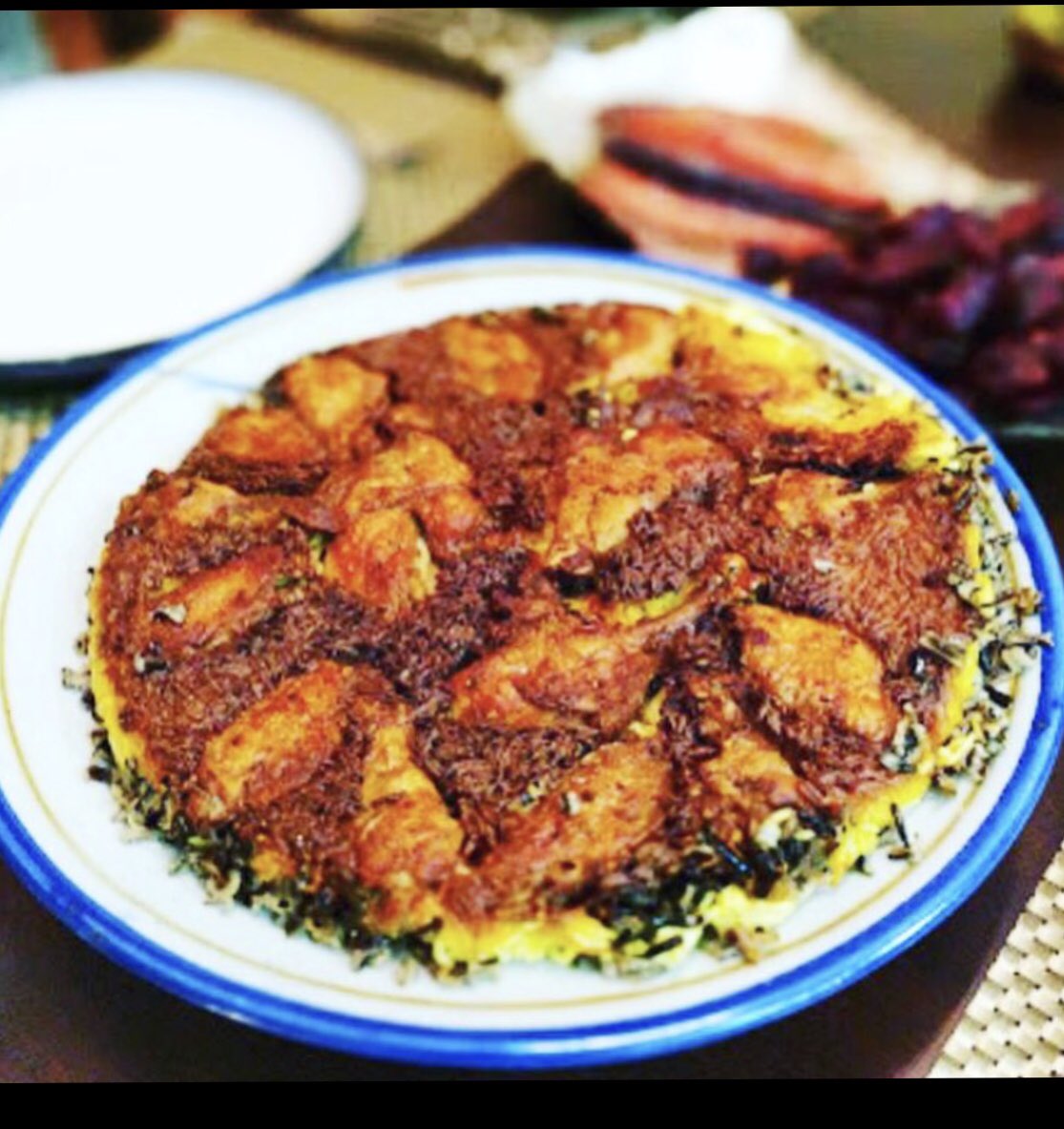 ChefZare's tweet photo. #crispyrice #tahdig #chicken #ChickenTahdig #bottomofthepot https://t.co/ovKJX9ZE8J