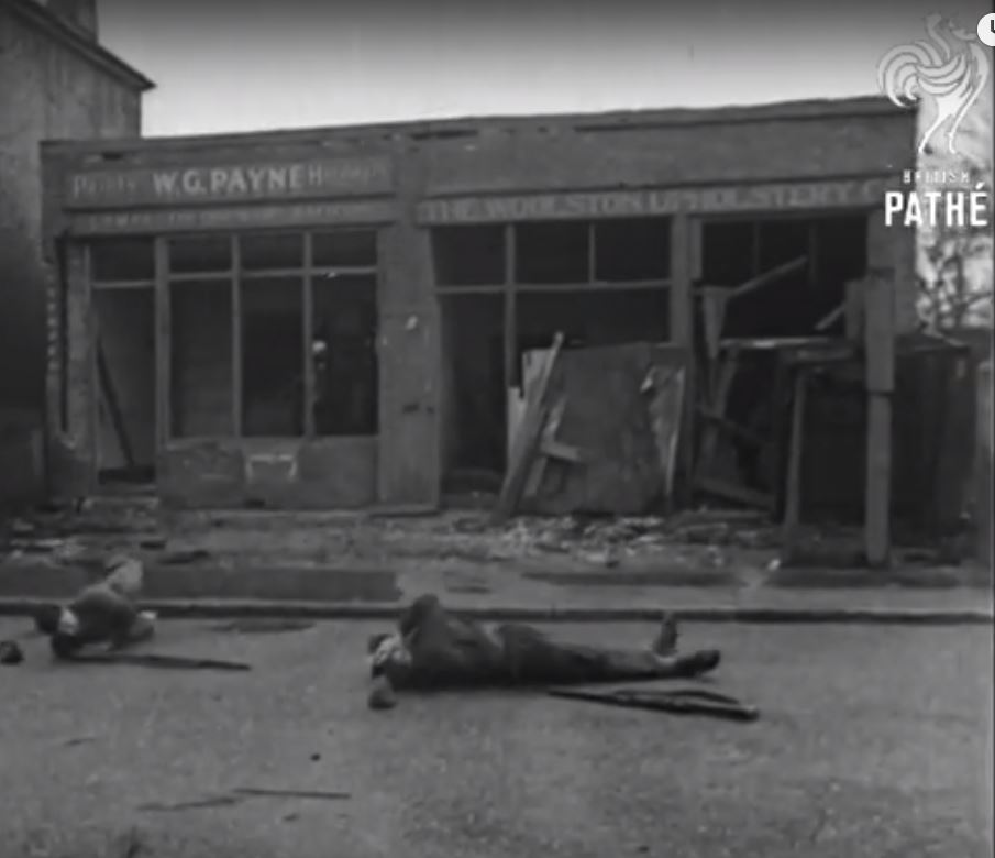 I've found a better quality video that proves it was taken at the same time as the pictures, and confirms it's Woolston. WG Payne, Woolston Upholstery Co. is sadly closed for business. Question is, is this sufficient evidence for IWM to update the records? 