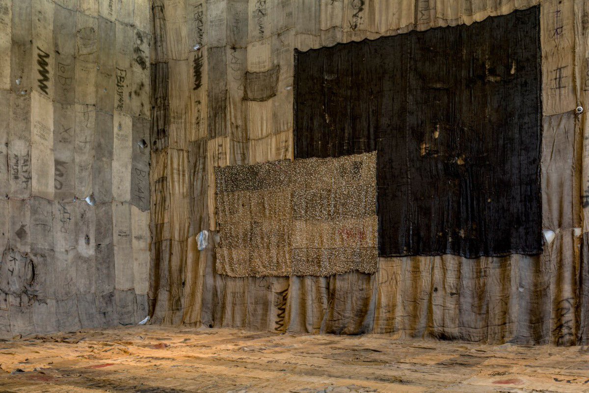 NorvalFdn's tweet photo. The humility of the hessian sacks used in "Ibrahim Mahama: Labour of Many" is contrasted with the spaces its installed in. From Ghana, to Venice, and now in Norval Foundation until August 11th. 

#IbrahimMahama #Installaion #VeniceBiennale #NorvalFoundation https://t.co/O2G7vnwGPm