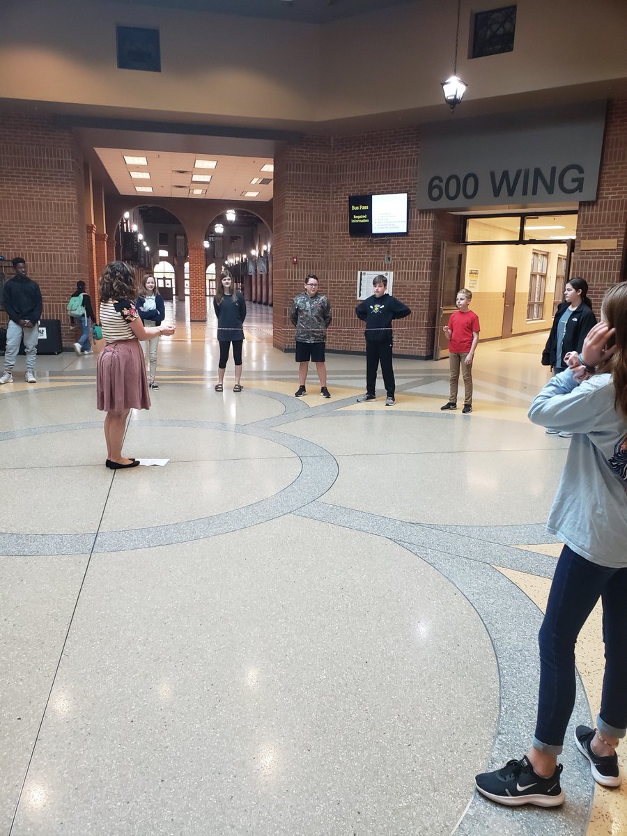 RichmondHillMS's tweet photo. Seventh Grade Math Students have been studying parts of a circle, and recently participated in a lesson in the atrium.  

Students demonstrated the definition and parts of a circle such as radius, diameter, chord, and circumference using themselves and string.  #WeAreRHMS https://t.co/3Yyujgopu9