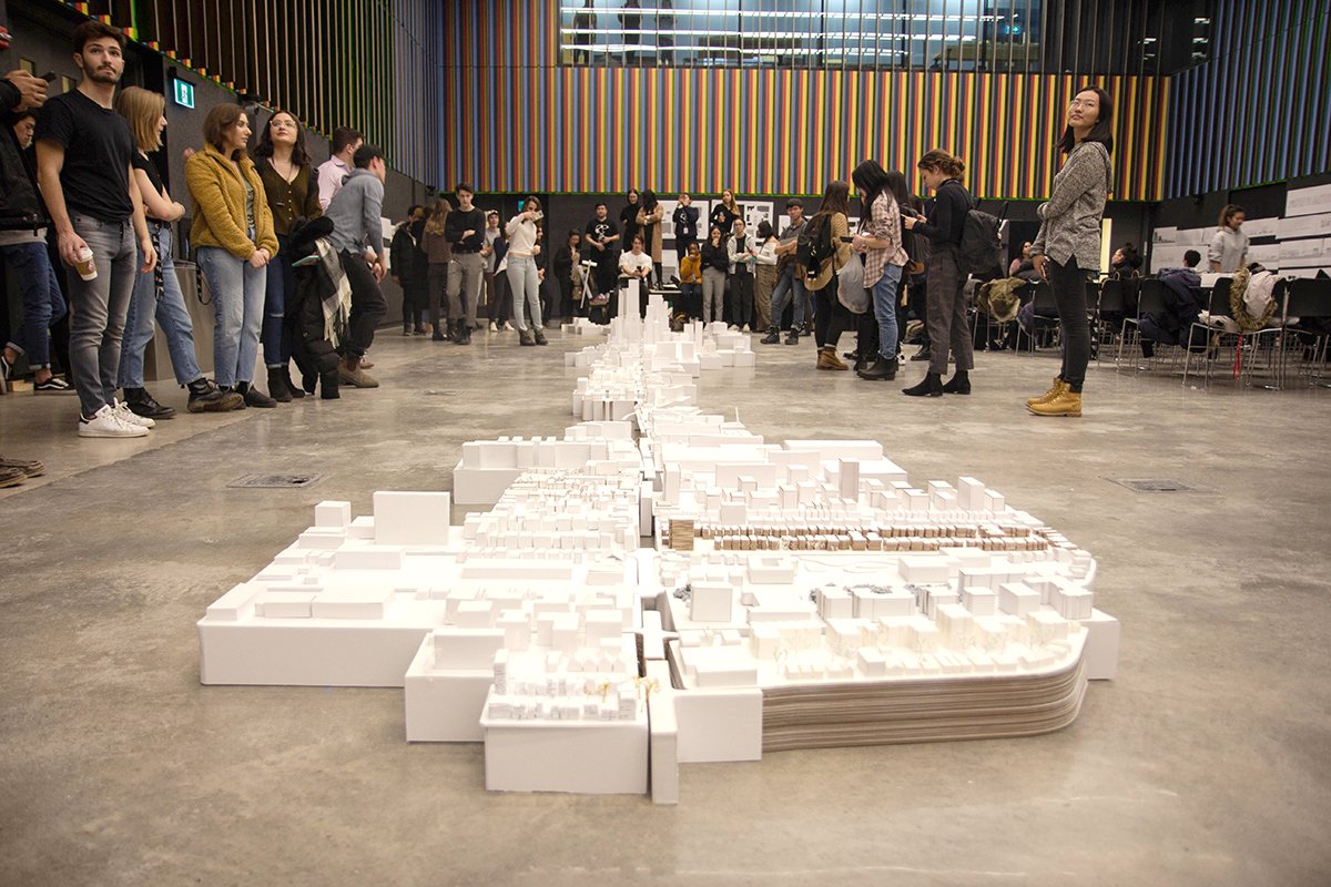UofTDaniels's tweet photo. Our undergraduate students made a 15-metre-long model of King Street from the Queensway to the Don River: https://t.co/7foZMm2ErZ #CloseReadingsinUrbanDesign #ArchitecturalStudies #Toronto #UofT #urbanism https://t.co/XIcyxtHDfS