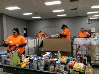 MissouriRevenue's tweet photo. St. Louis Field Compliance Bureau employees helped @OPFoodSearch by packing, marking UPC codes, and sorting food last weekend. DOR employees appreciate the opportunity to serve our communities and look forward to continuing to serve in the future. #DORGivesBack #WeServeMo https://t.co/BtmkSkS50U