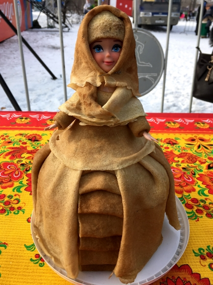 nathaninberlin's tweet photo. Absolutely obsessed with these images of Barbies in Russia draped with blinis https://t.co/gTmCuHkSbf