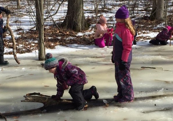 Childreach's tweet photo. Our #wildchild day camp is in full swing with ice, ice and more ice.  The campers practiced navigating the icy terrian using creative ways to move through the forest. They experimented with their footing and balance on a shallow frozen pond.  #capable #competent #forestkids https://t.co/1TlWnSa0xc