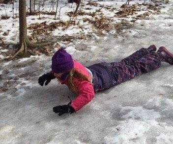 Childreach's tweet photo. Our #wildchild day camp is in full swing with ice, ice and more ice.  The campers practiced navigating the icy terrian using creative ways to move through the forest. They experimented with their footing and balance on a shallow frozen pond.  #capable #competent #forestkids https://t.co/1TlWnSa0xc