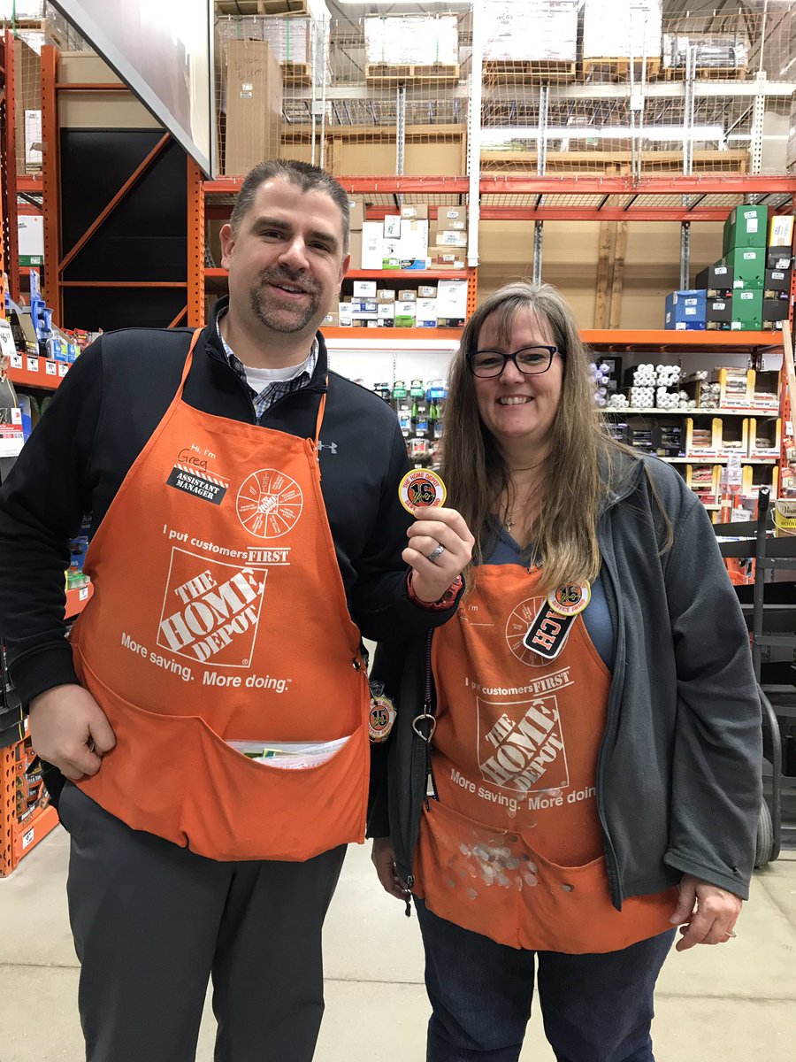 Just a couple of associates celebrating 16yrs of bleeding orange. Congrats Jen!!