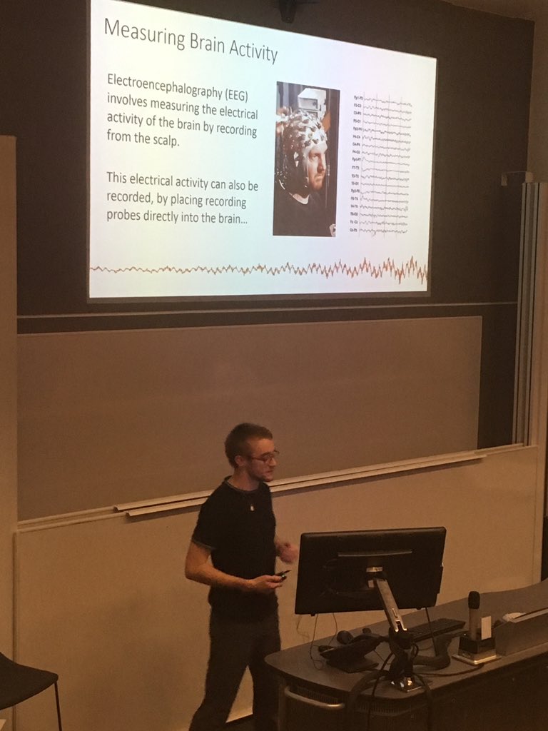 DrSorayaM's tweet photo. Next talk by Callum Walsh on Brain Waves & Dementia featuring @JonTBrown wearing an EEG cap! @UofE_Research @ExeterMed #BAWExeter #BrainAwarenessWeek2019 https://t.co/rWlmbVBgfa