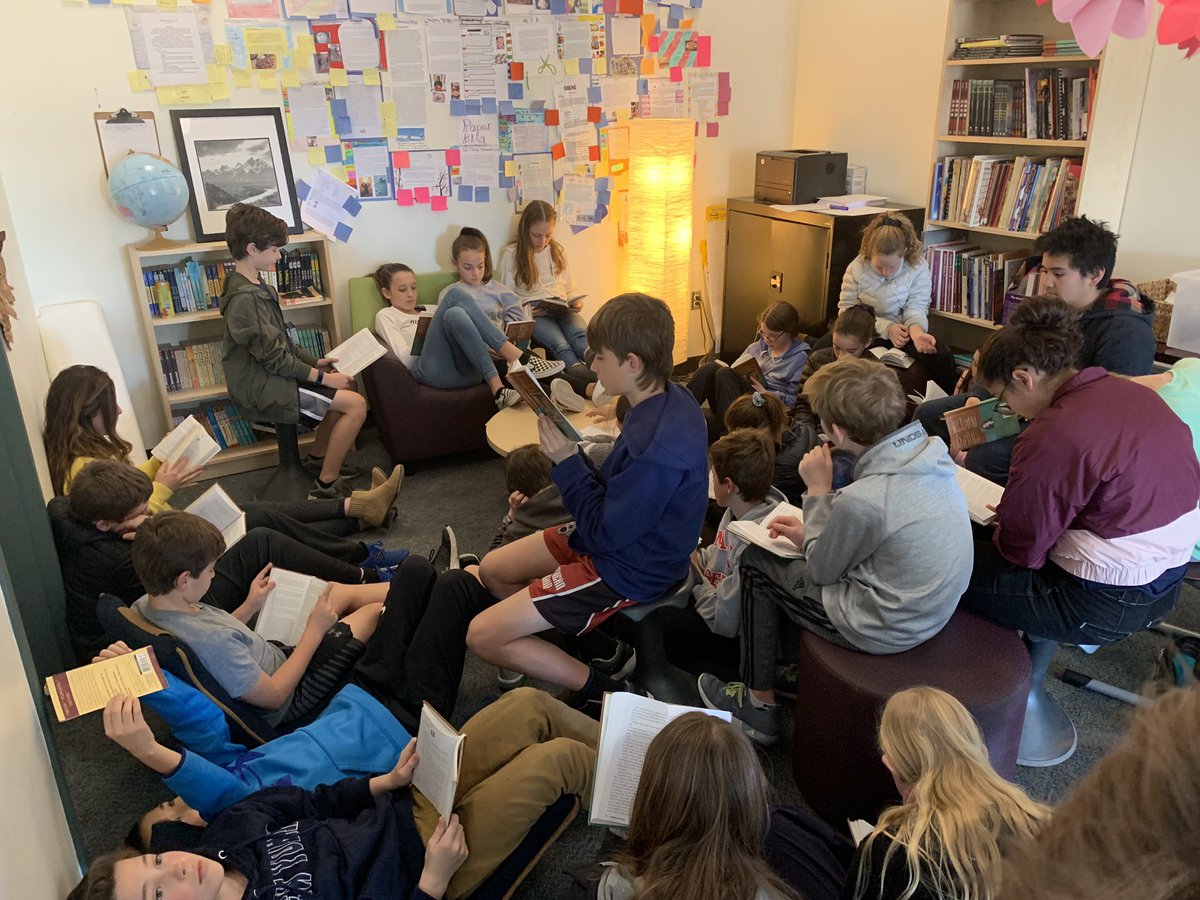 HallMiddle's tweet photo. Cozying up to “Tuck Everlasting” in @MsIrvingTweets’s 6th grade Core! No matter our age, stories are powerful and transformative. #elachat #literacy https://t.co/ZlKOS9H7oy