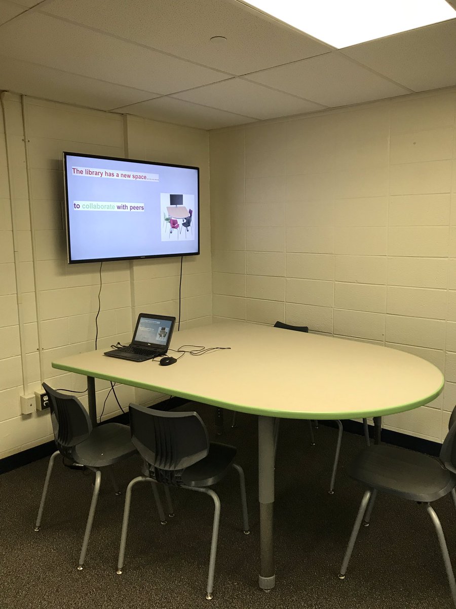 CresciMarty's tweet photo. Ms. Wright our media specialist remodeling the look of the AIHS library #AIHSTigerpride #collaborationcenter https://t.co/xoTvhvfeC8