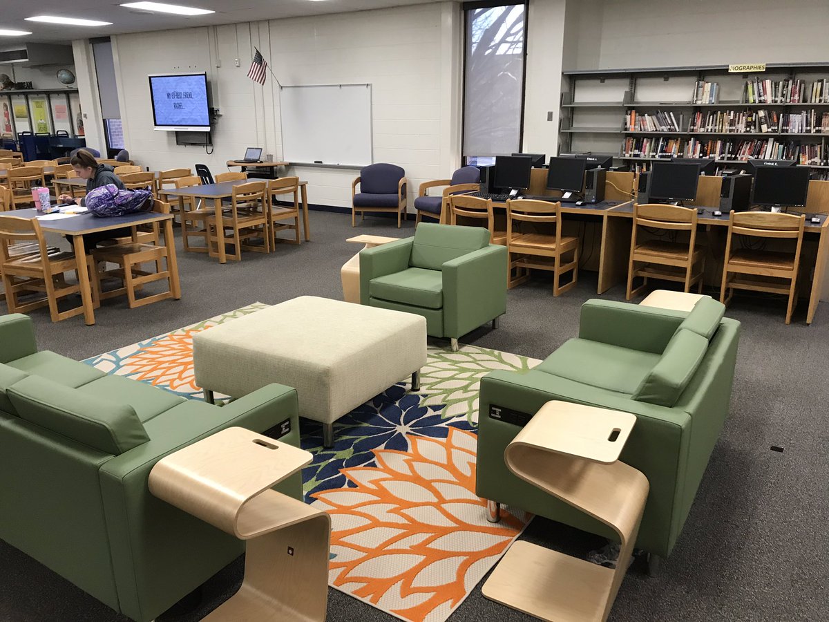 CresciMarty's tweet photo. Ms. Wright our media specialist remodeling the look of the AIHS library #AIHSTigerpride #collaborationcenter https://t.co/xoTvhvfeC8