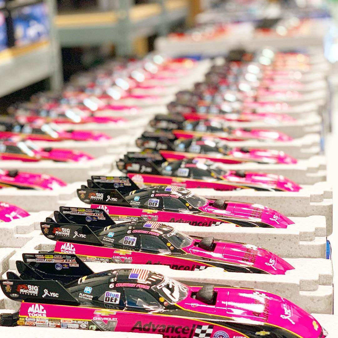 courtneyforce's tweet photo. Lots of @AdvanceAuto die cast funny cars to sign at the shop today! Love this pink @YSCBuzz car that I ran for #breastcancerawareness month. One of my favs. 💕 
.
.
#Autographs #Diecast #OneDownLotsToGo #AdvanceXForce #YSC #JFR #QALOteam https://t.co/u0RIelij7E