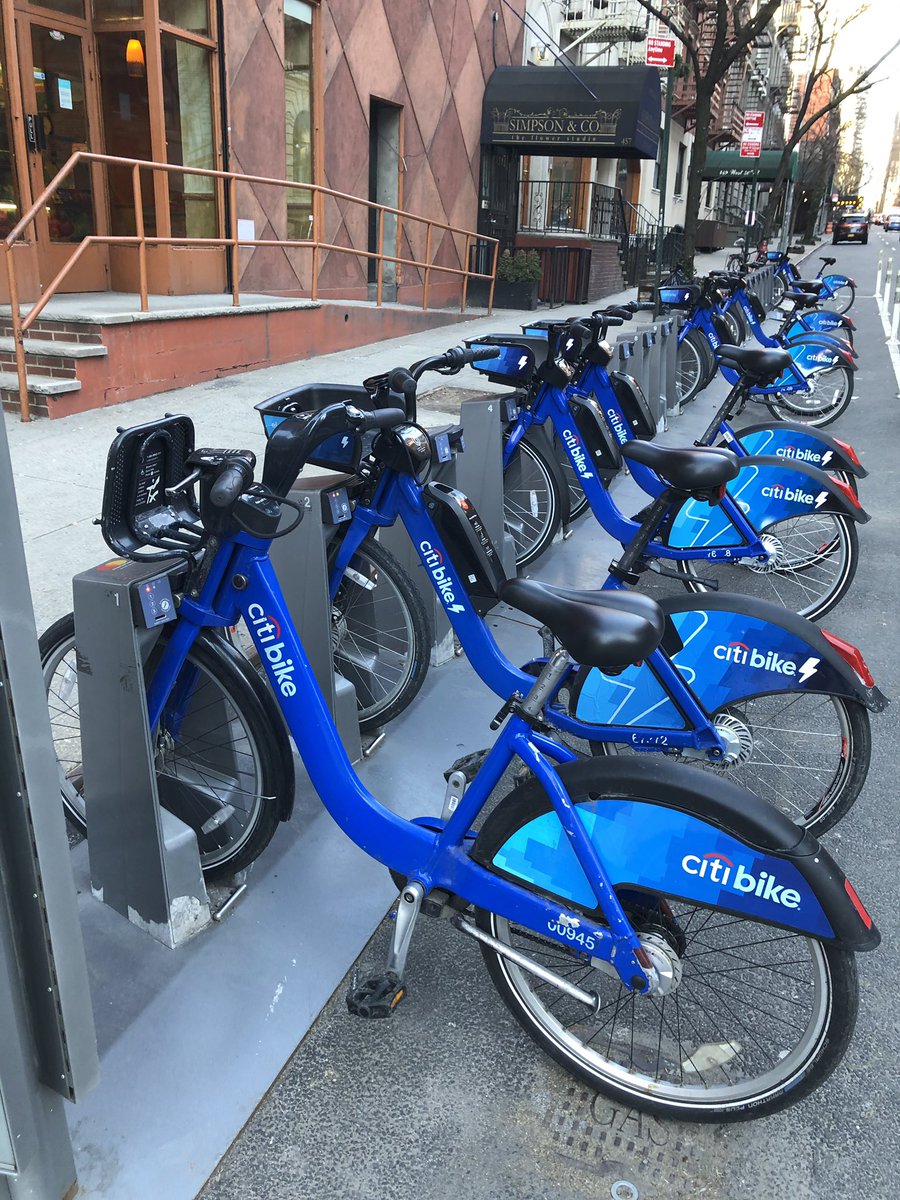 ricksteve's tweet photo. @CitiBikeNYC It's going to be hard to justify $2 a ride when all the electric bikes on this rack (except the one I just docked) are red. #citibikefail https://t.co/cRDPKrBaCy