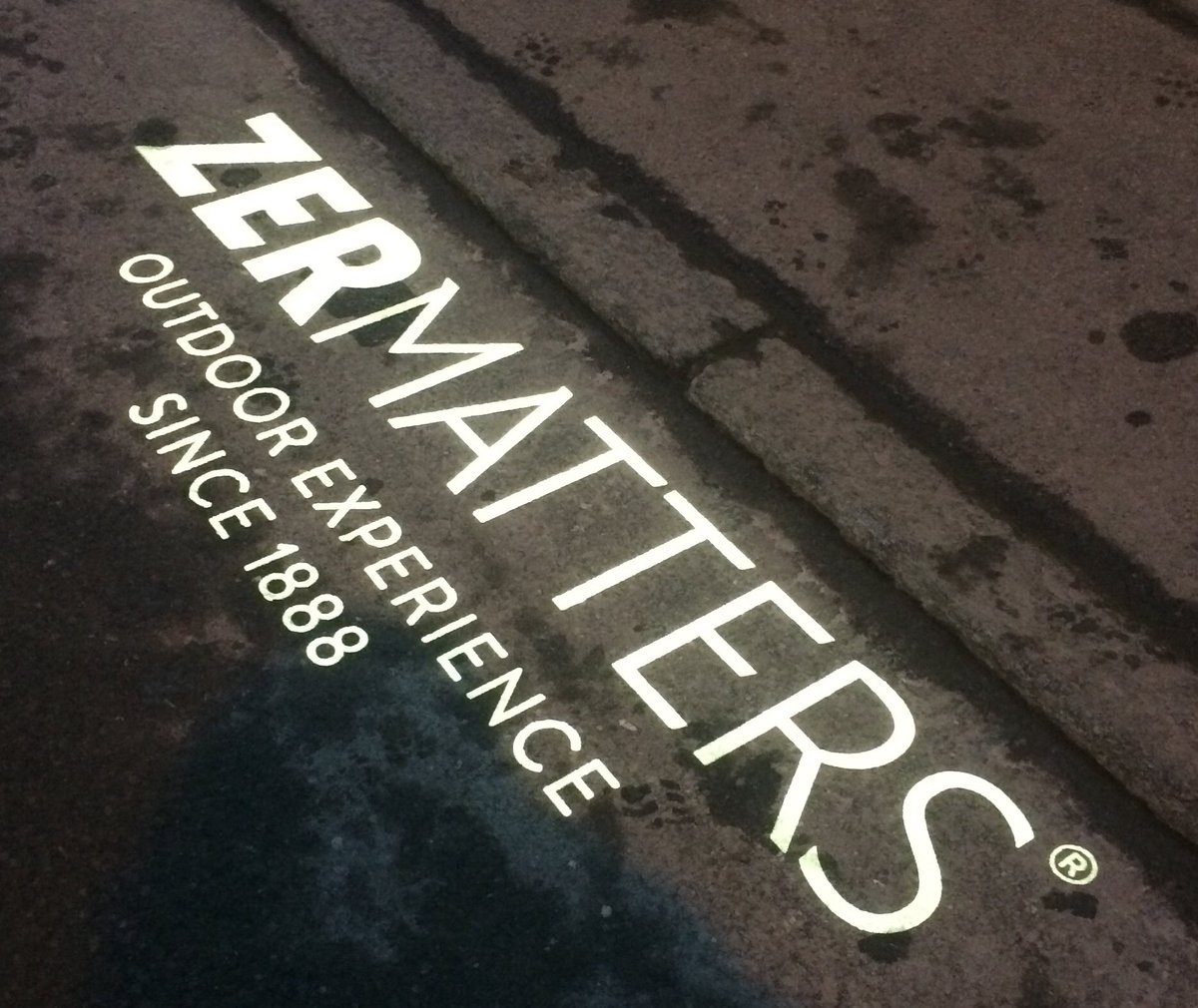 ICSZermatt's tweet photo. Hit the streets today to check hotels have our info leaflets. Lovely welcomes from @HotelParnass @cervozermatt @MCP_Zermatt @schonegg3920 and many others. And loving the light sign on the pavement #zermatters https://t.co/hJDHYU18p6