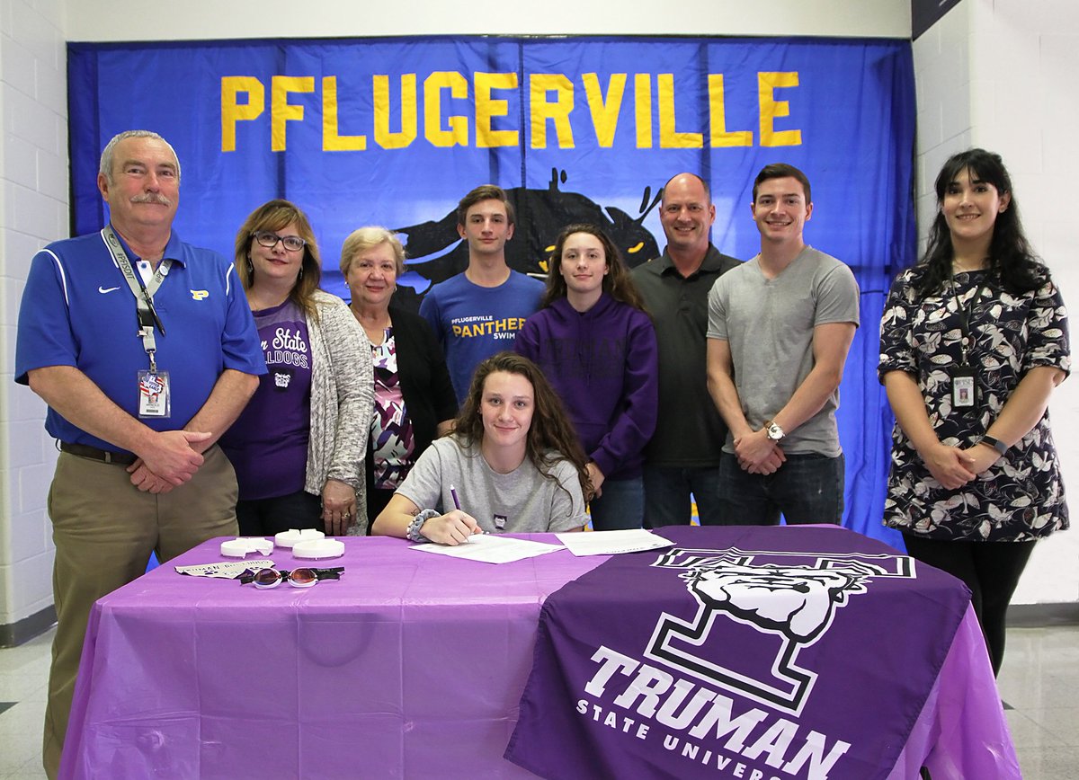 PflugervilleHS's tweet photo. . @PflugervilleHS senior Nicole Willis today signed her letter of intent to swim for @TrumanAthletics . Swim coaches Nicole Wuest and Walter Arnold, Principal Ameka Hunt and @pfisd Board President Vernagene Mott joined Nicole and her friends and family in the celebration. https://t.co/mcaNGujzT7