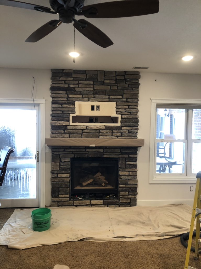 Jacobe_HI_LLC's tweet photo. Finished grouting this fireplace today! (Didn’t get a finished picture yet...and started putting the stone on the bar and kitchen area! https://t.co/1D69TB0p5v
