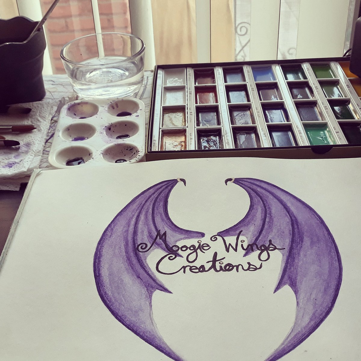 MoogieWingsC's tweet photo. #moogiewingscreations #watercolor #watercolorpainting #art #myart #artist #wings #kuretakegansaitambi #kuretake #artpage #logo #newprofilepicture #purplewings #watercolor https://t.co/XqUDQoOMw8
