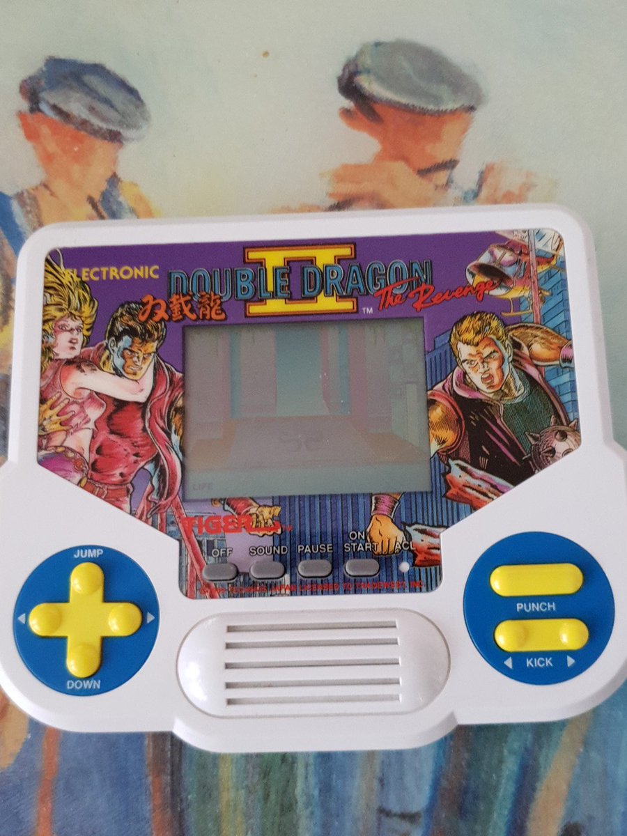 Thesweeney70s's tweet photo. Charity shop finds electronic double Dragon 2 game from 1988 https://t.co/heeQZg07T4
