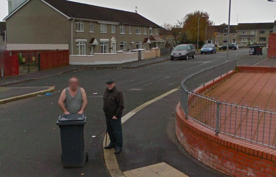 Big fella taking the bin out in Twinbrook. October 2012.