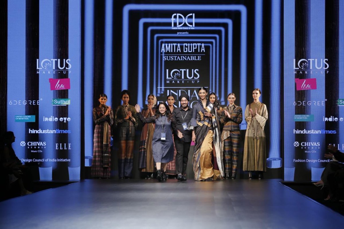 fdciofficial's tweet photo. #AmitaGuptaโs collection unfolds a conscious design that weaves a story between contrasting threads of denim, silk and Zari. Strong silhouettes illustrated with pleated details and nautical stripes blends contemporary and traditional designs. #LMIFW.
@LotusHerbals @LIVAFashionIn https://t.co/nHsg8RhyHC