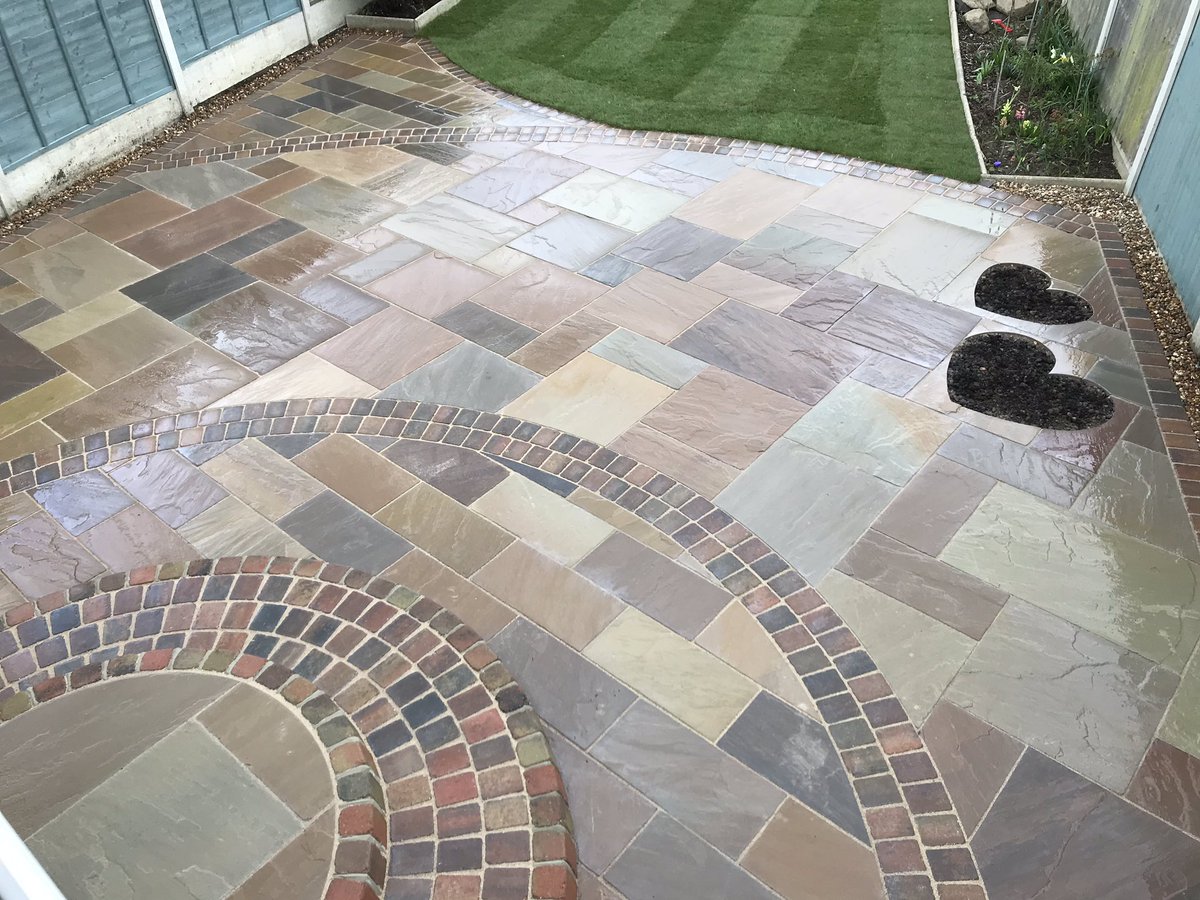leeharveydesign's tweet photo. @BradstoneUK @Sarahhennem latest project finished today autumn green sandstone with autumn Woburn rumbled blocks used to create this radial design.2 love hearts cut out to create 2 memorial bed for roses to be planted 👍🏻 https://t.co/l9wjWkW9MD