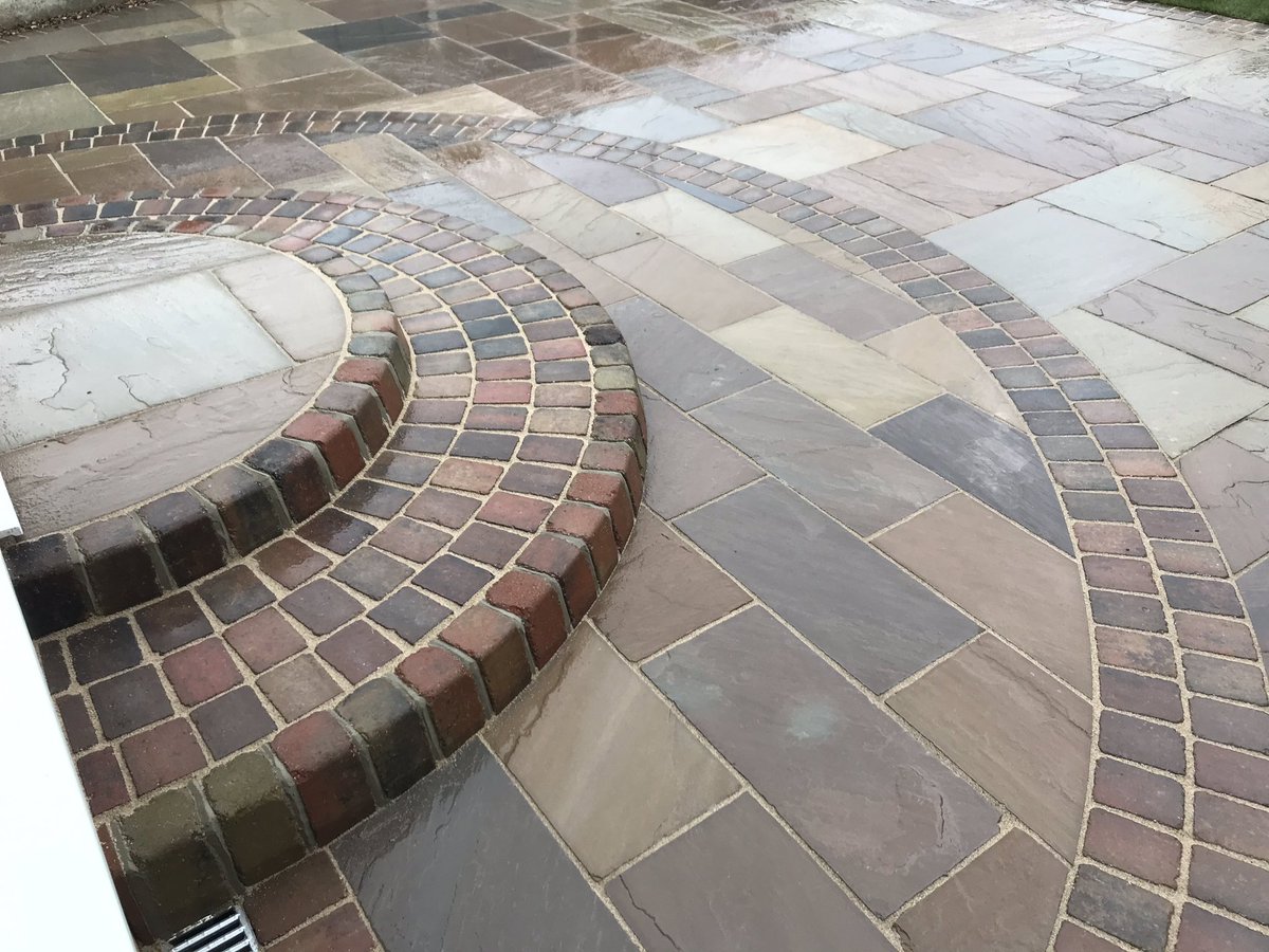 leeharveydesign's tweet photo. @BradstoneUK @Sarahhennem latest project finished today autumn green sandstone with autumn Woburn rumbled blocks used to create this radial design.2 love hearts cut out to create 2 memorial bed for roses to be planted 👍🏻 https://t.co/l9wjWkW9MD