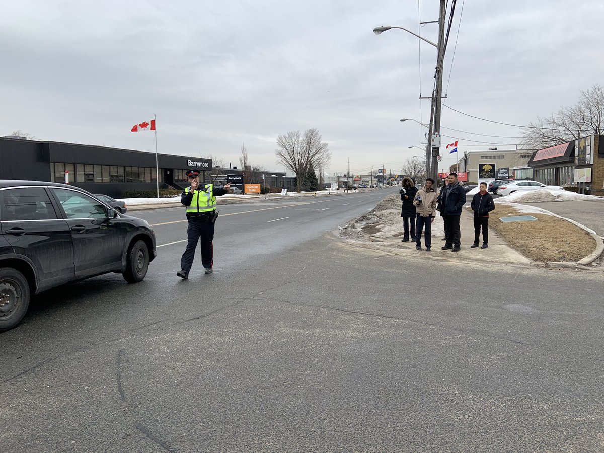 TPS13Div's tweet photo. .@officer8594 is out with our @youthinpolicing students teaching them radar enforcement and educating drivers during @TorontoPolice March break traffic campaign. #WakeUpToronto #Drivesafe https://t.co/LuB6PonHp4