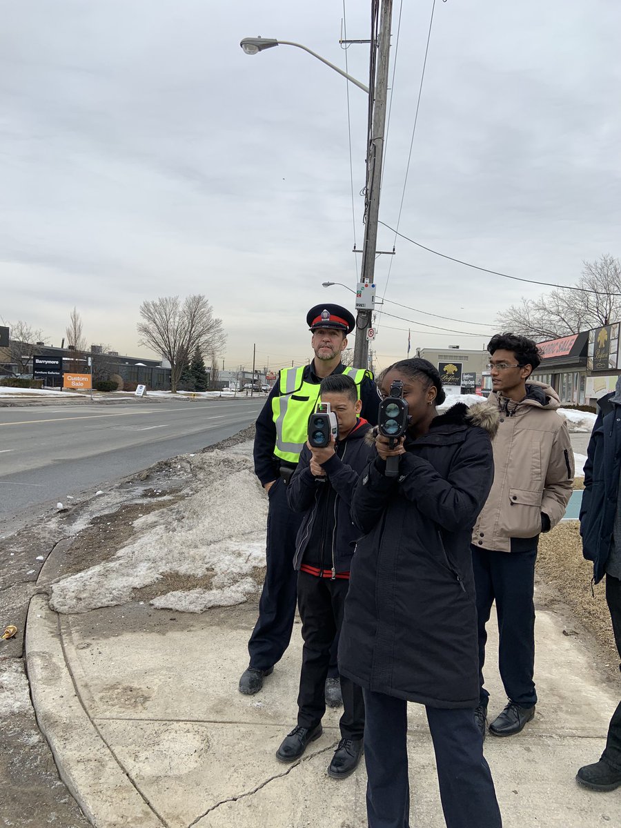 TPS13Div's tweet photo. .@officer8594 is out with our @youthinpolicing students teaching them radar enforcement and educating drivers during @TorontoPolice March break traffic campaign. #WakeUpToronto #Drivesafe https://t.co/LuB6PonHp4