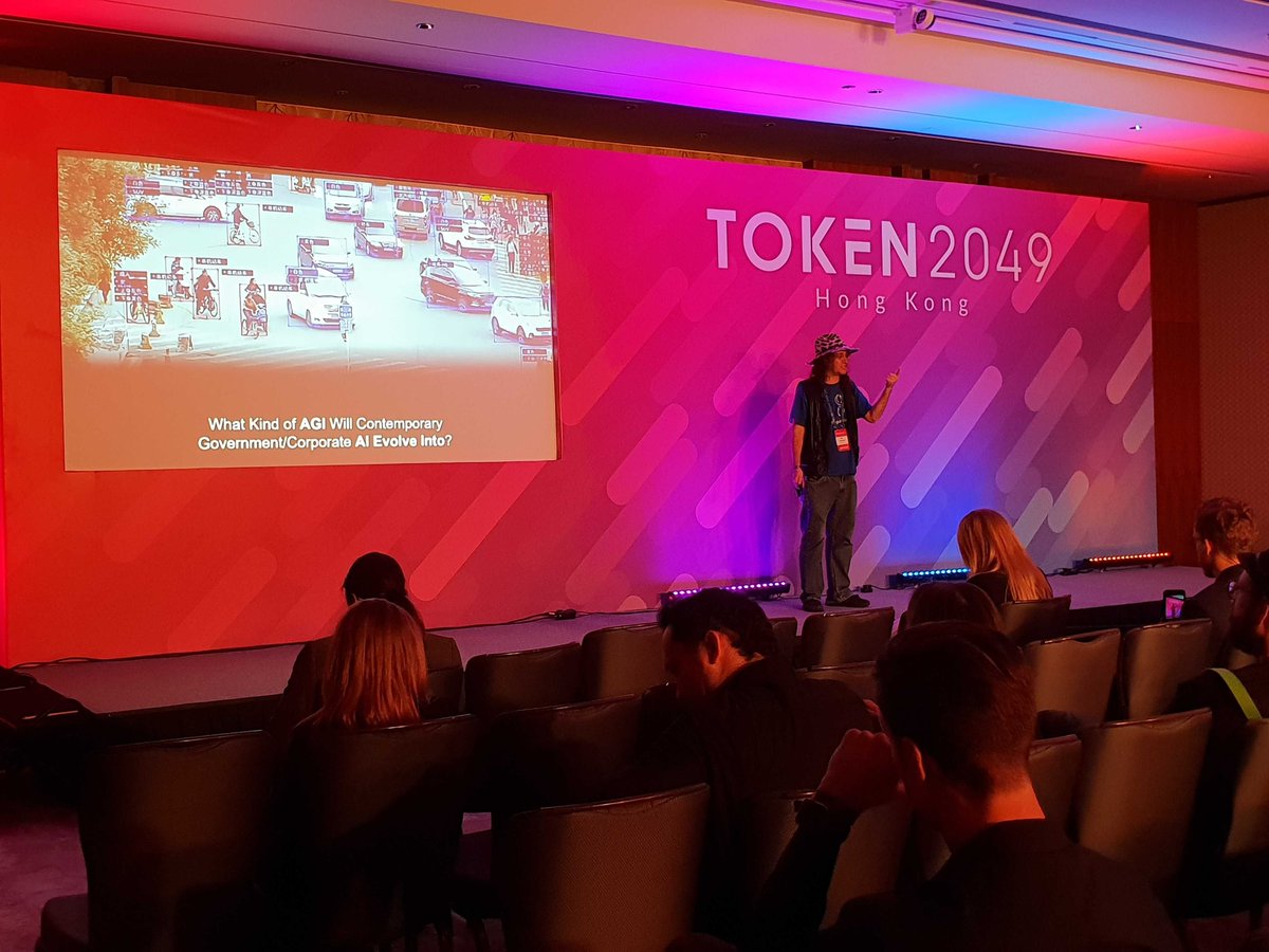 SingularityNET's tweet photo. Today, at TOKEN2049 - the flagship event of the Asia Crypto Week - Dr. Ben Goertzel delivered a keynote speech on developing benevolent Artificial General Intelligence and the features of our Beta. We also have great news for our community that we will share shortly, stay tuned! https://t.co/ZtaJvH6k8k