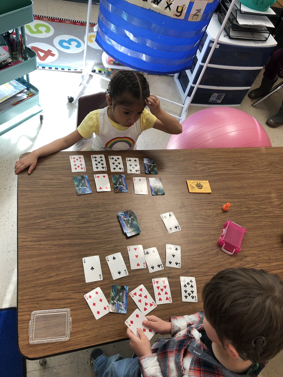 austenlady84's tweet photo. Playing “Garbage” to help with number sense and subitizing. They are already remembering where the cards need to go without counting every time! Thanks for teaching us such a great game @Bullindles! @DiggsLatham #DLESFocus https://t.co/GEklHQLGaC